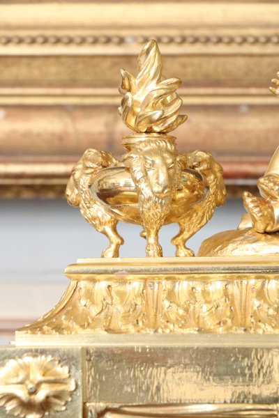 Pair of Louis XVI gilt bronze andirons