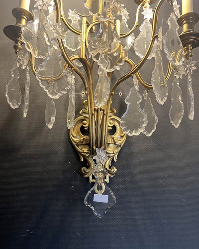 Paire d’appliques en bronze doré et verre taillé