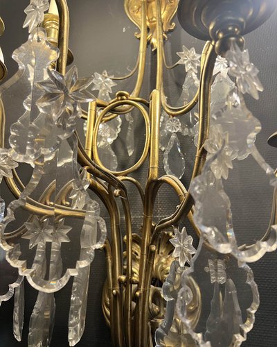Paire d’appliques en bronze doré et verre taillé