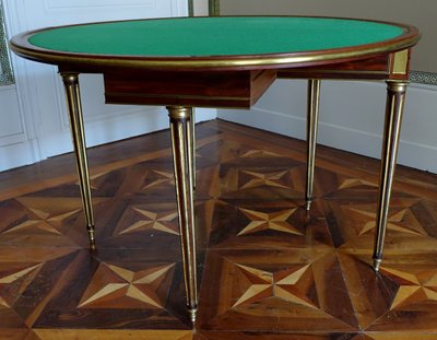 Mahogany half-moon game table / dining table, Louis XVI Directoire period - late 18th century