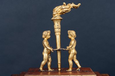 Maison Balthazard mahogany ormolu cherub clock enamel dial