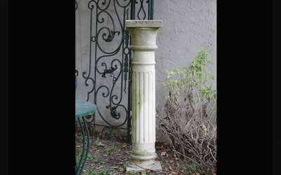 Column in reconstituted stone