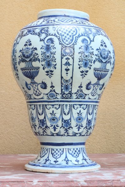 Set of three Rouen earthenware vases