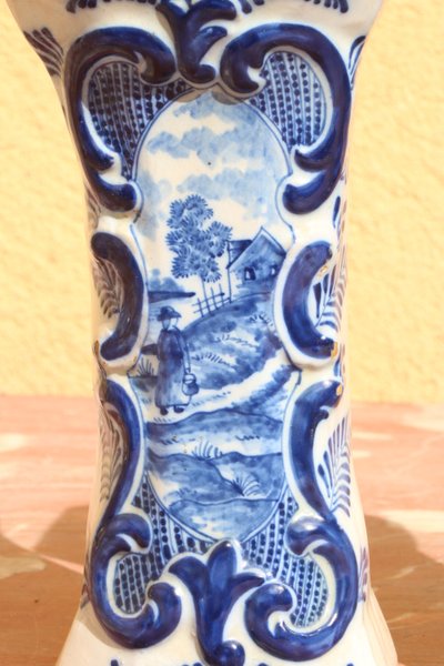 Set of three Rouen earthenware vases