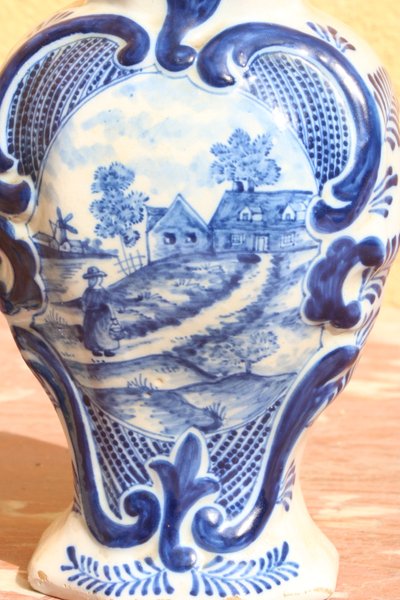 Set of three Rouen earthenware vases