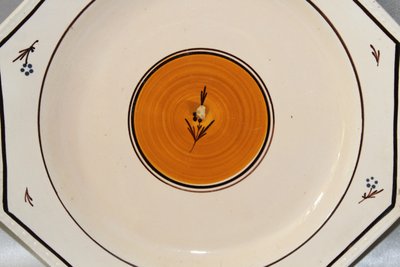 Pair of Nevers earthenware ocotogonal beaded plates signed Dubois 18th century