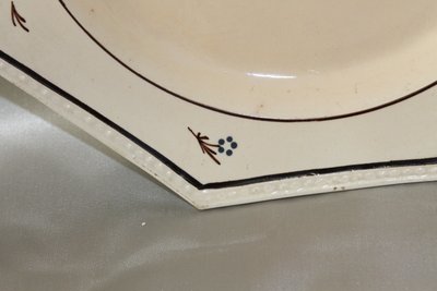 Pair of Nevers earthenware ocotogonal beaded plates signed Dubois 18th century