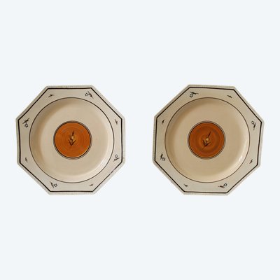 Pair of Nevers earthenware ocotogonal beaded plates signed Dubois 18th century