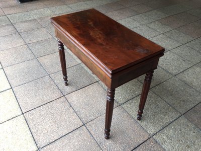 A 19th-century mahogany games table
