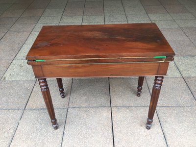 A 19th-century mahogany games table