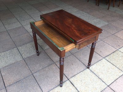 A 19th-century mahogany games table