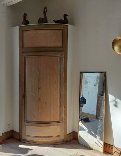 Two antique oak cornerboards curved cupboard doors