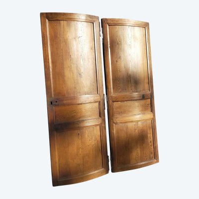 Two antique oak cornerboards curved cupboard doors
