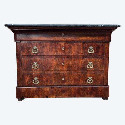Commode époque restauration en placage d’acajou flammé