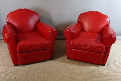Paire de fauteuils club en cuir