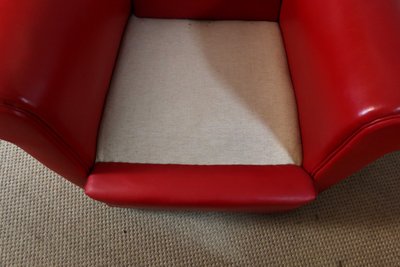 Paire de fauteuils club en cuir