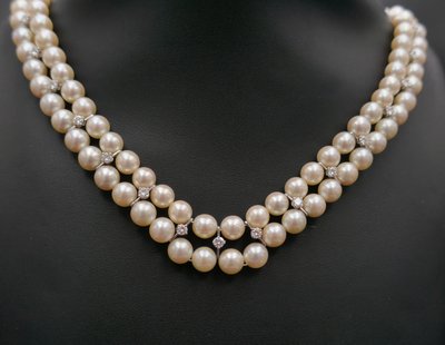 Double strand of pearls and diamonds 1.70 carat.