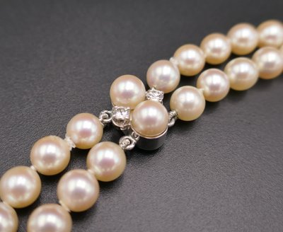 Double strand of pearls and diamonds 1.70 carat.