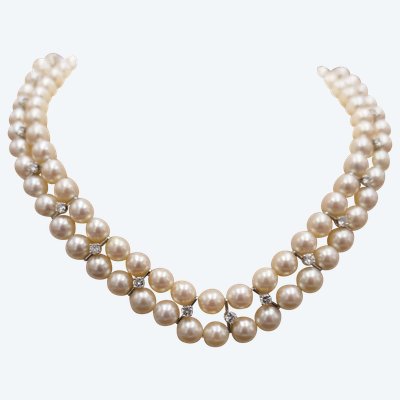 Double strand of pearls and diamonds 1.70 carat.