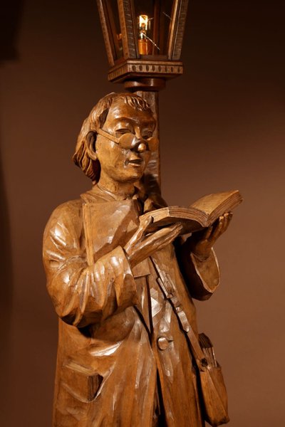 An amusing sculpture of a Ukrainian bibliophile/bookworm.