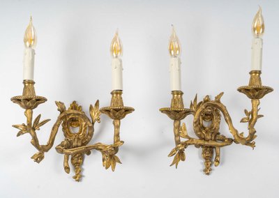 Set of four Chiseled Bronze two-light sconces Italy circa 1850