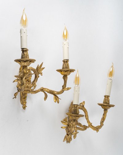 Set of four Chiseled Bronze two-light sconces Italy circa 1850