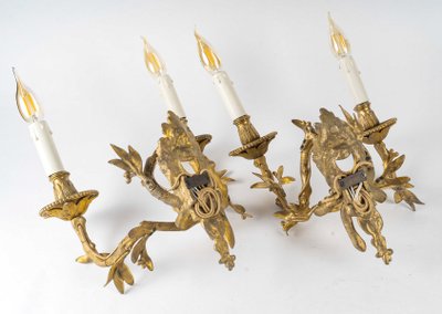 Set of four Chiseled Bronze two-light sconces Italy circa 1850