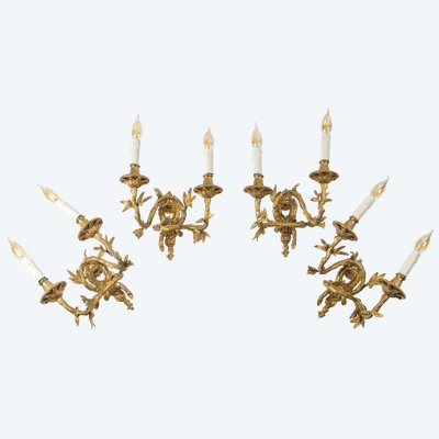 Set of four Chiseled Bronze two-light sconces Italy circa 1850