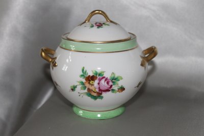 Part of a Samson porcelain tea service: teapot, sugar bowl, milk jug