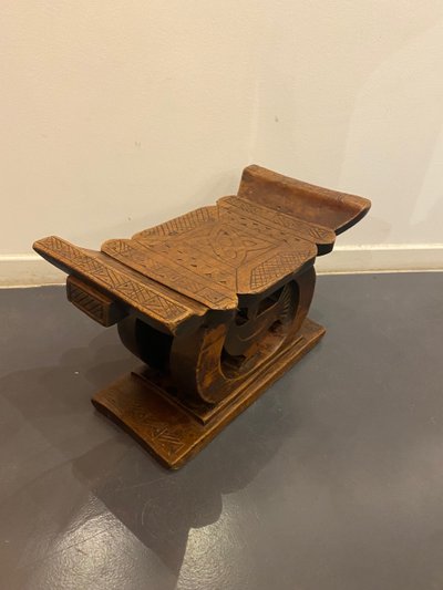 Ashanti stool with Sankofa bird from Ghana