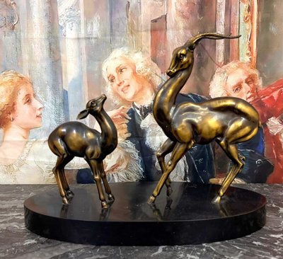 Sculpture Antilopes époque Art Déco en régule patine cuivrée 