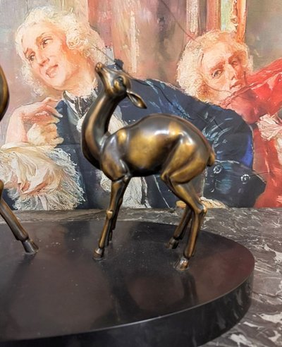 Sculpture Antilopes époque Art Déco en régule patine cuivrée 