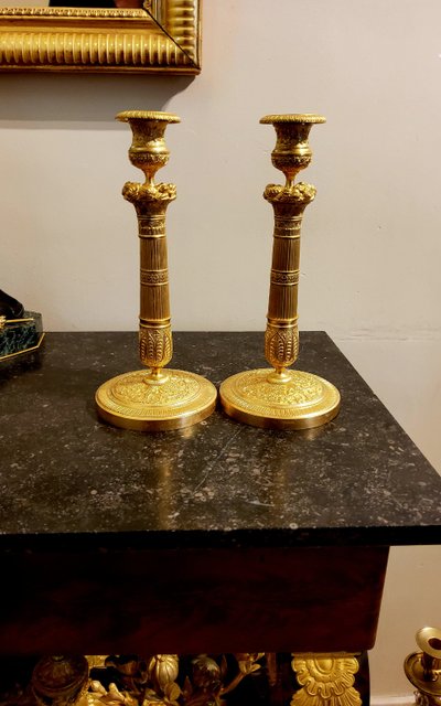 Pair of gilded and chased bronze Flambeaux Restoration 19th century