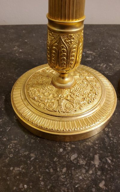 Pair of gilded and chased bronze Flambeaux Restoration 19th century