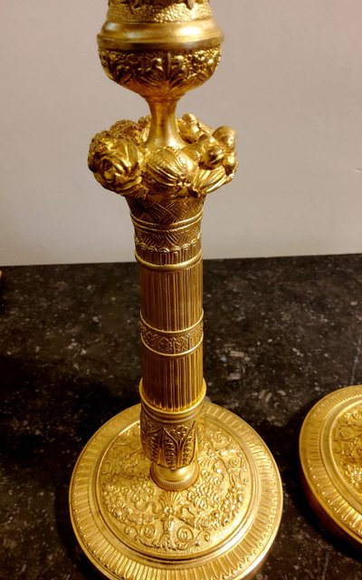 Pair of gilded and chased bronze Flambeaux Restoration 19th century
