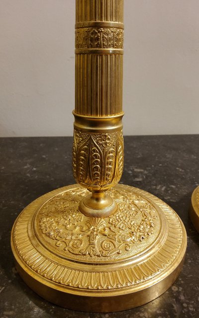 Pair of gilded and chased bronze Flambeaux Restoration 19th century