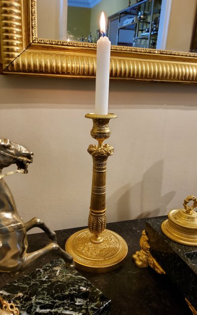 Pair of gilded and chased bronze Flambeaux Restoration 19th century