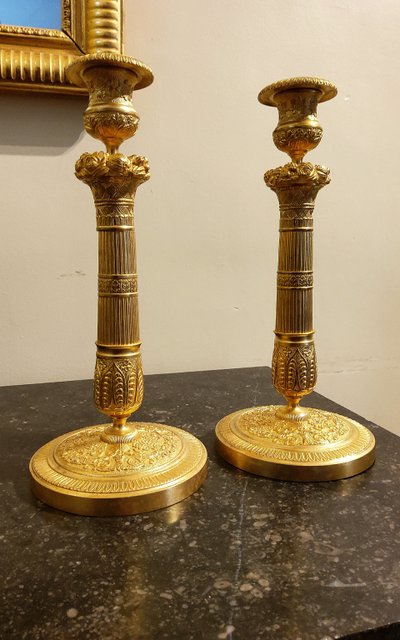 Pair of gilded and chased bronze Flambeaux Restoration 19th century