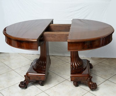 Antique Empire table in mahogany with central foot. Belgium, 19th century.