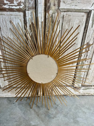 Miroir soleil en métal doré circa 1960