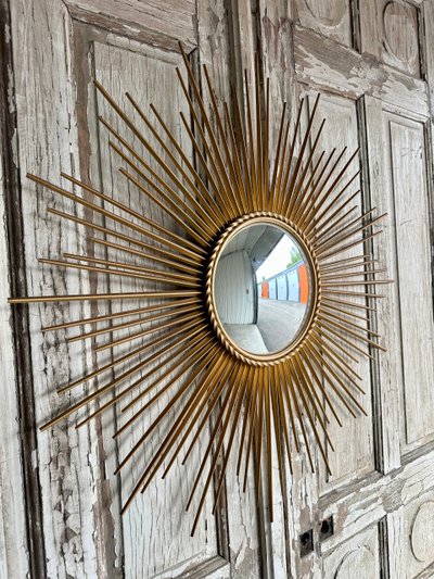 Miroir soleil en métal doré circa 1960