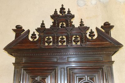 Louis XIII diminutive walnut sideboard complete with highly decorative pediment from the 17th century