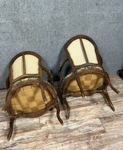 Louis XV period armchair cabriolets in carved wood from the 18th century