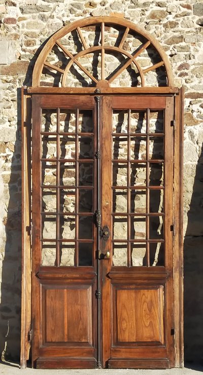 Double porte vitrée ancienne en chêne Orangerie avec son imposte cintrée