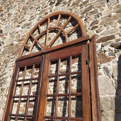 Double porte vitrée ancienne en chêne Orangerie avec son imposte cintrée