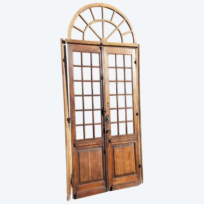 Double porte vitrée ancienne en chêne Orangerie avec son imposte cintrée