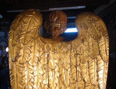 Large pair of gilded solid wood angels, 18th century
