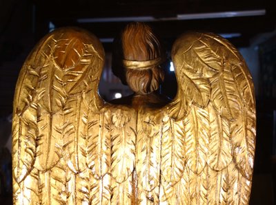 Large pair of gilded solid wood angels, 18th century