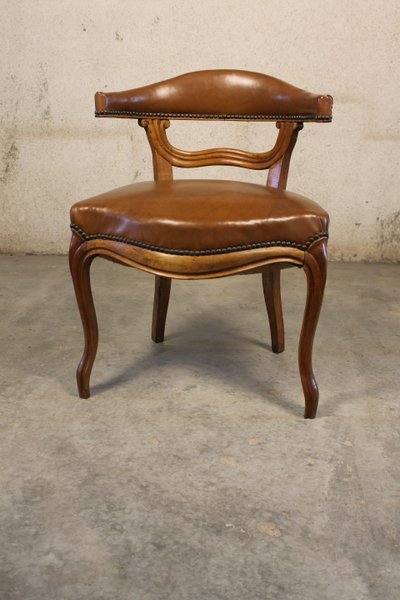 19th century Louis XV style walnut desk armchair upholstered in havana leather