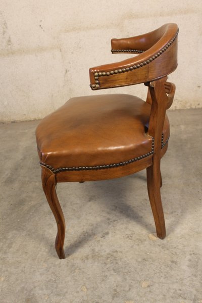 19th century Louis XV style walnut desk armchair upholstered in havana leather